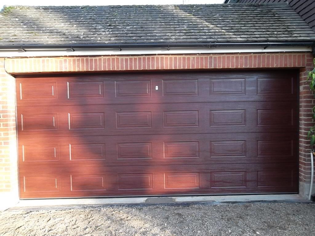 CARTECK ROSEWOOD PANELLED SECTIONAL GARAGE, OXSHOTT Doormatic Garage Doors