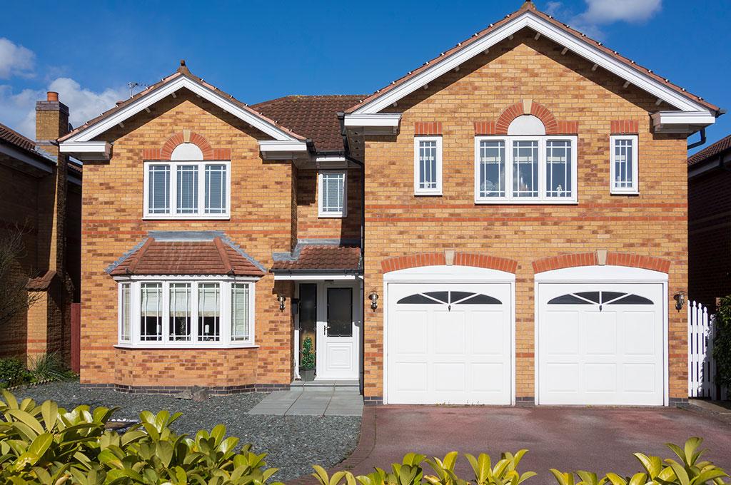 White is a popular garage door colour for modern houses